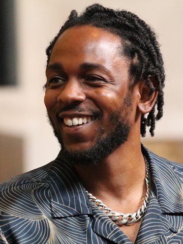 Kendrick Lamar, smiling