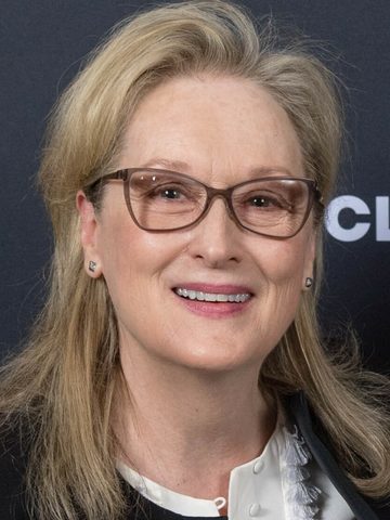 Meryl Streep in glasses, smiling