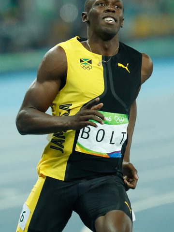 Usain Bolt running in the 100-meter final at the Rio 2016 Olympics